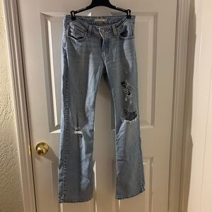 Levi's Light Blue Distressed Boot Cut Jeans